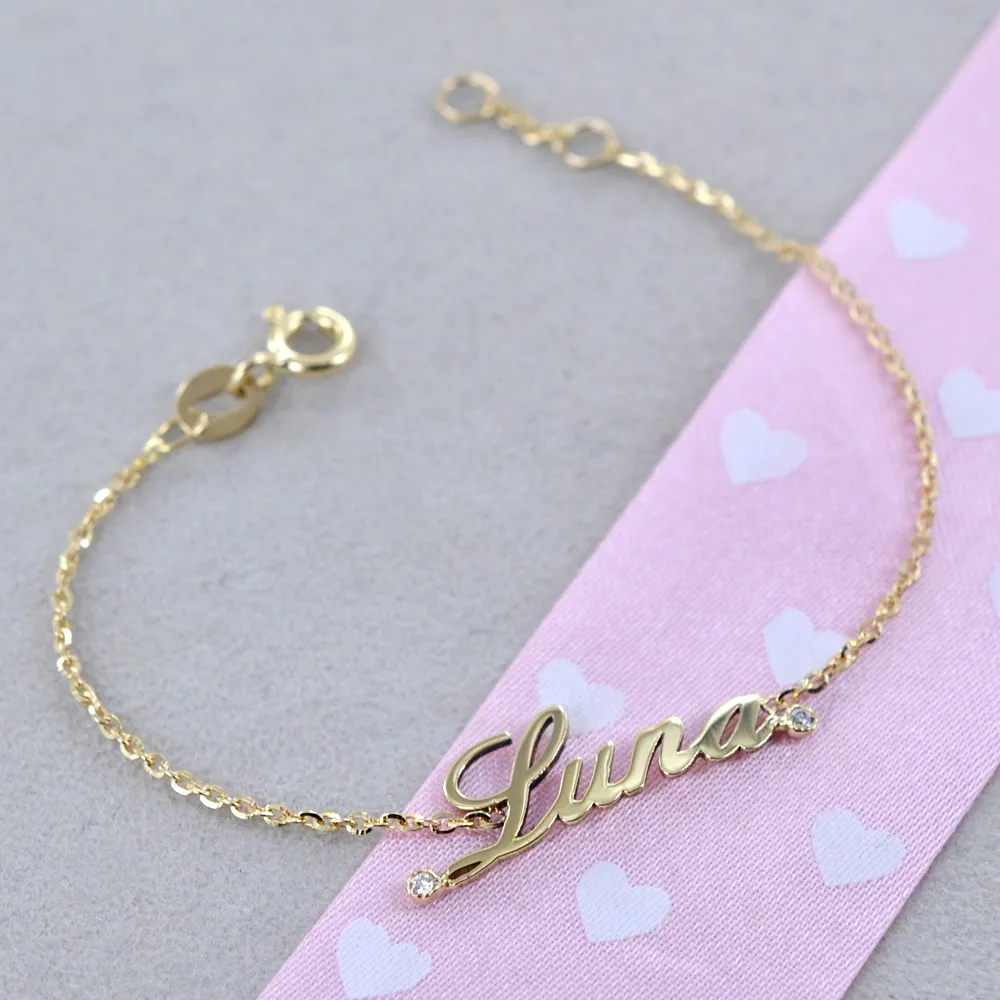 Bracciale da bambino personalizzato con nome in oro giallo e 2 diamanti